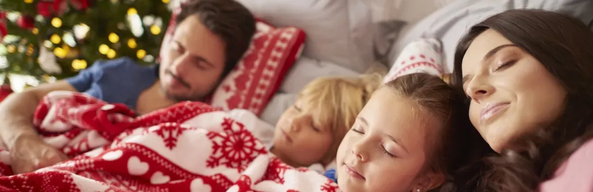 family sleepng and christmas decor